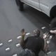 Tashii Brown is seen with his hands in the air as Las Vegas Police Officer Kenneth Lopera deploys his Taser. (Las Vegas Metropolitan Police Department via YouTube screenshot)